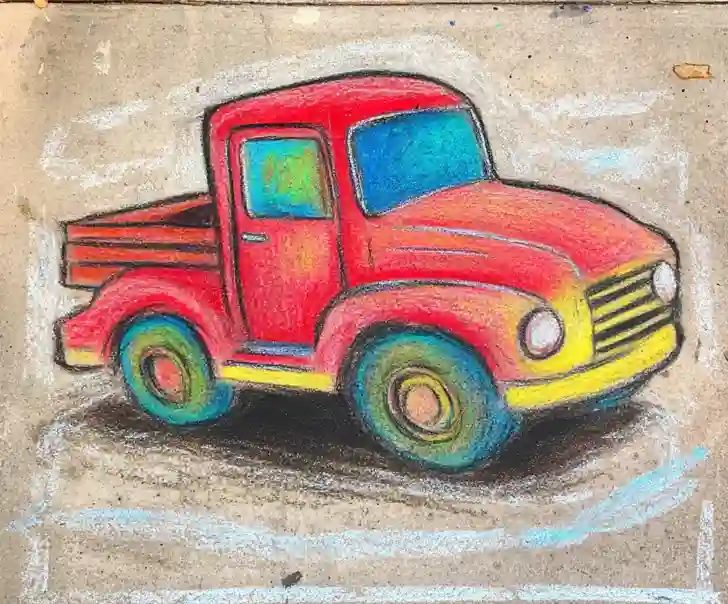 Easy chalk drawing of a red truck on the pavement