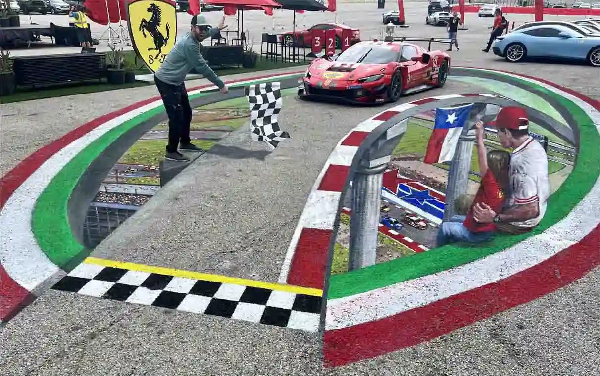 Ferrari Challenge 3D chalk art, a 24ft x 40ft branded street painting by Chris Carlson in Austin, Texas