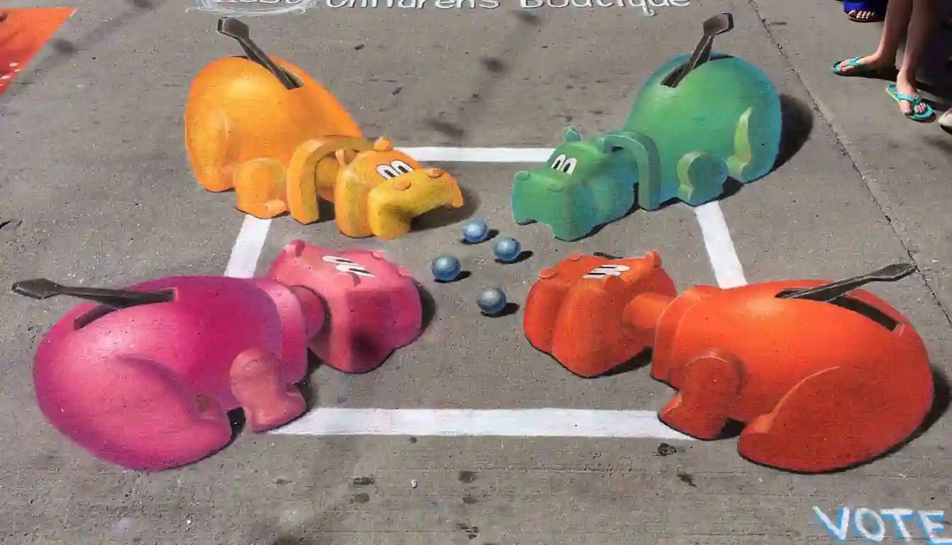 Hungry Hungry Hippos 3D chalk art, a 10ft x 10ft interactive street painting by Chris Carlson in Denver, Colorado