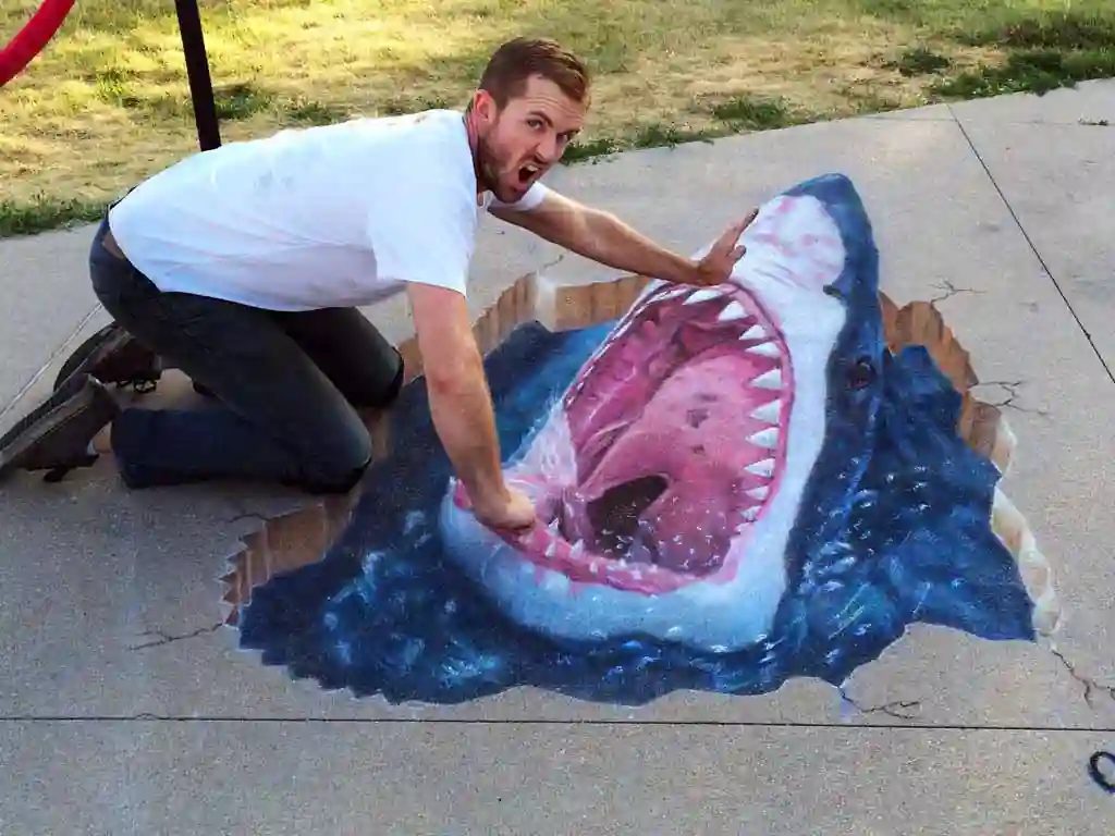 Jaws shark 3D chalk art illusion, a 5ft x 8ft street painting by Chris Carlson in Denver, Colorado