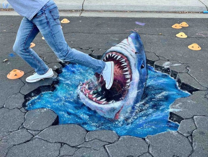 Interactive 3D chalk art of a shark breaking through the ground by Chris Carlson